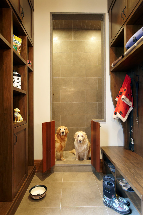 If you share your home with pets, the mudroom is the perfect spot for a gated pet shower and to store dog food, treats, leashes and blankets and towels.