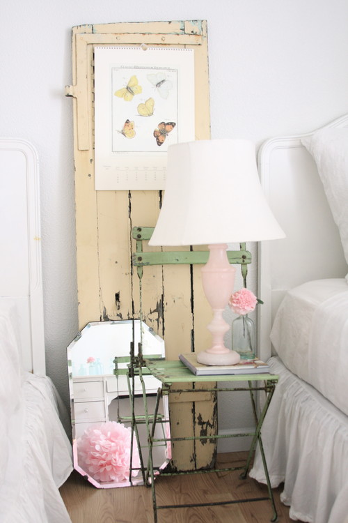 Use a rustic chair as a beautiful nightstand as seen on Dreamy Whites. See more repurposing projects on Design Dazzle!