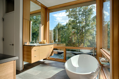 Extra windows bring natural light into your master bathroom. 