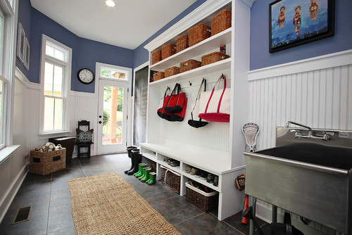 mudroom organization should address what people need coming into the house, like this sink to clean up