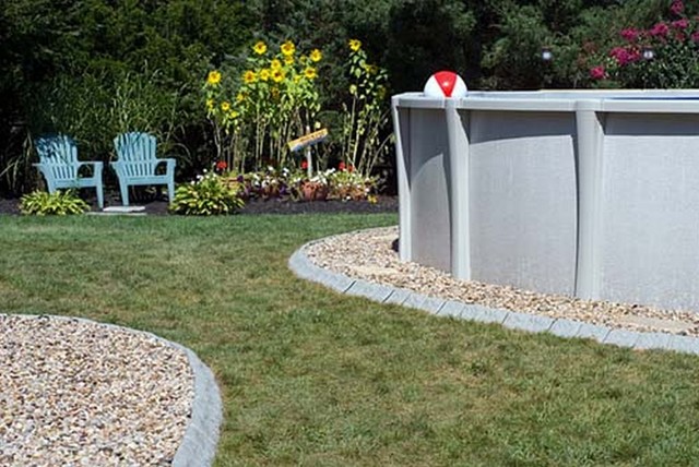 Stone Edge around Pool traditional-landscape