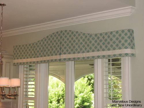 How do you open the plantation shutter with this valance coming over