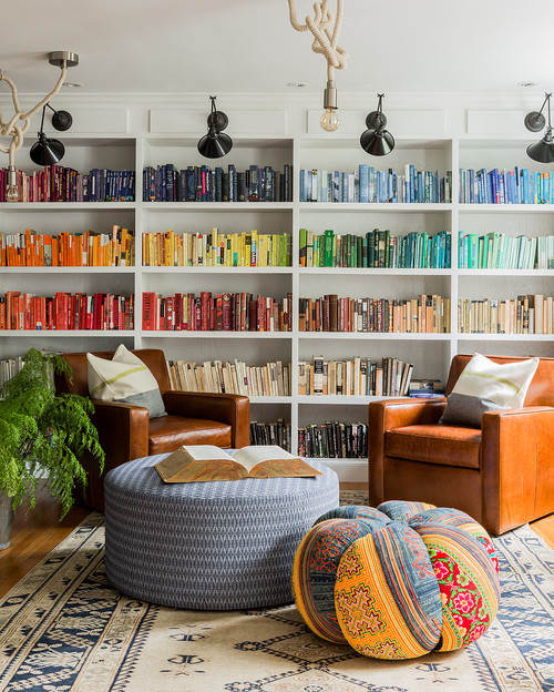 wonderful bookshelves arranged by color (like mine) with lots of great comfy seating - one of 8 picks for this week's Friday Favorites
