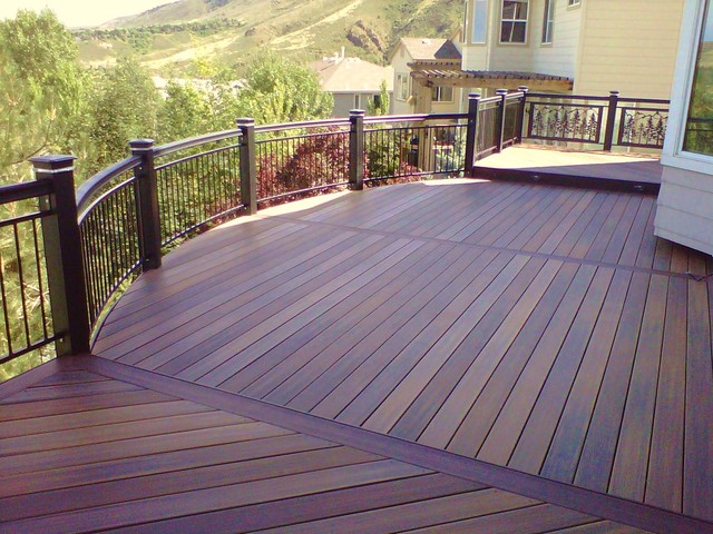 Curved Deck with Custom Iron Railings and LED Lighting ...